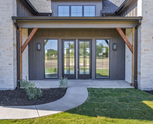 Custom home construction team planning luxury home build in Granbury TX